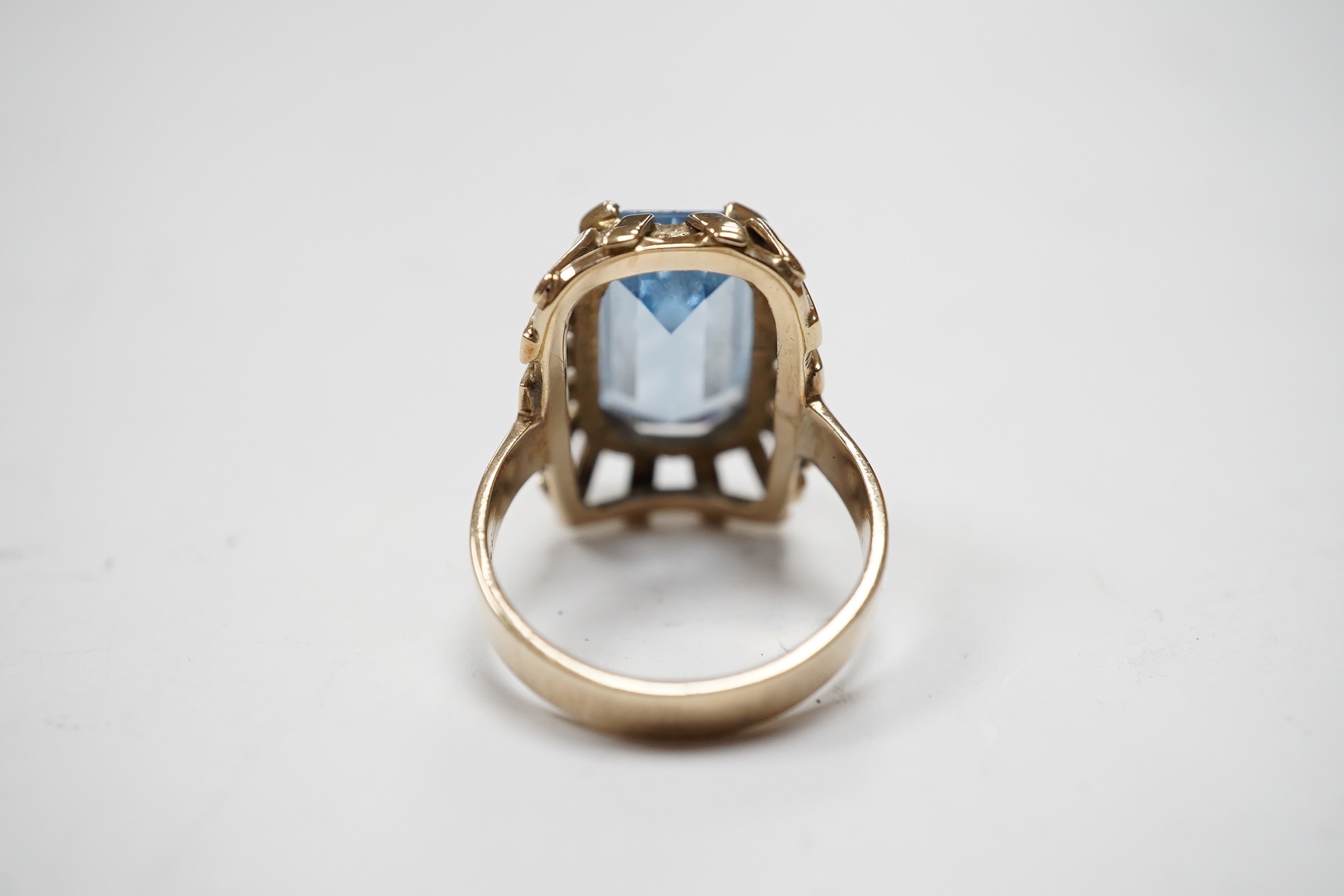 An 8ct yellow metal and single stone synthetic blue spinel set dress ring, size P, gross weight 7.3 grams, Condition - fair to good.